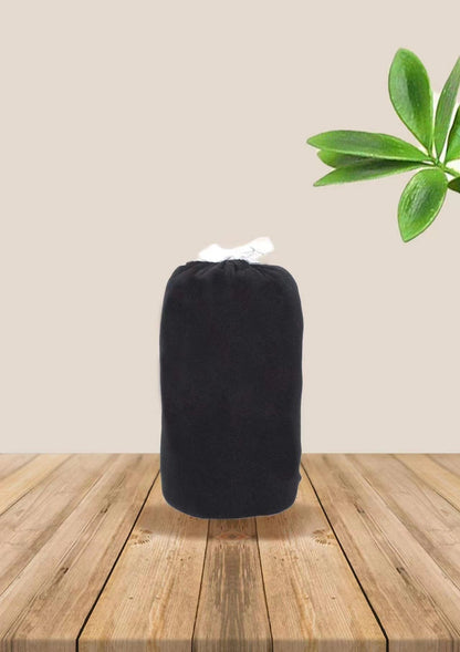 Baby wrap carrier in Black, rolled up for storage