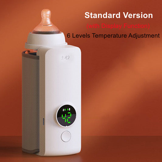 Rechargeable portable baby bottle warmer in white with digital temperature display, holding a baby bottle