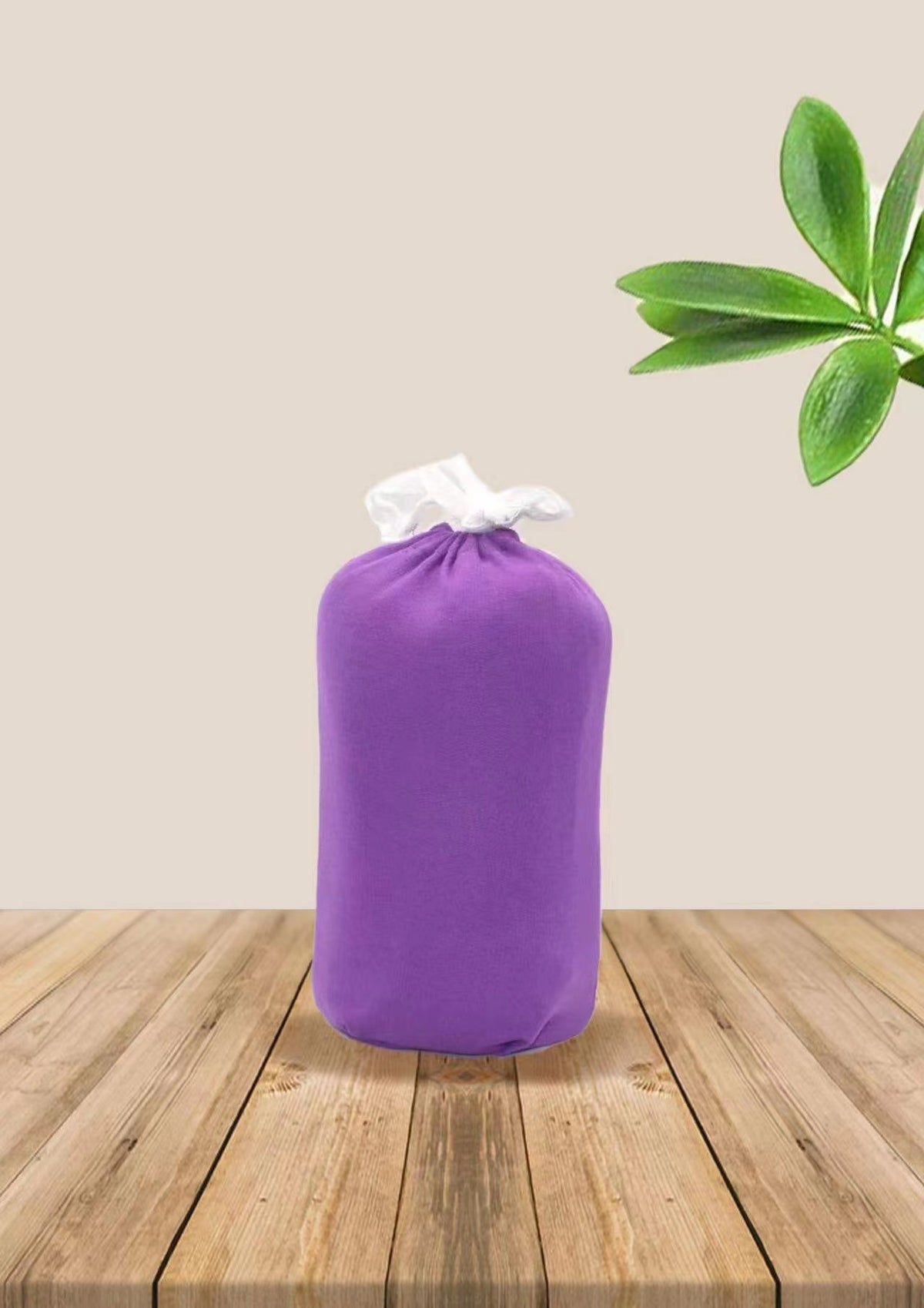 Baby wrap carrier in Purple, rolled up for storage