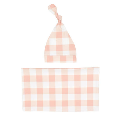 Newborn swaddle blanket and knotted hat set in peach gingham