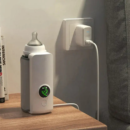 Two views of the rechargeable bottle warmer fitted to a baby bottle, with the portable base